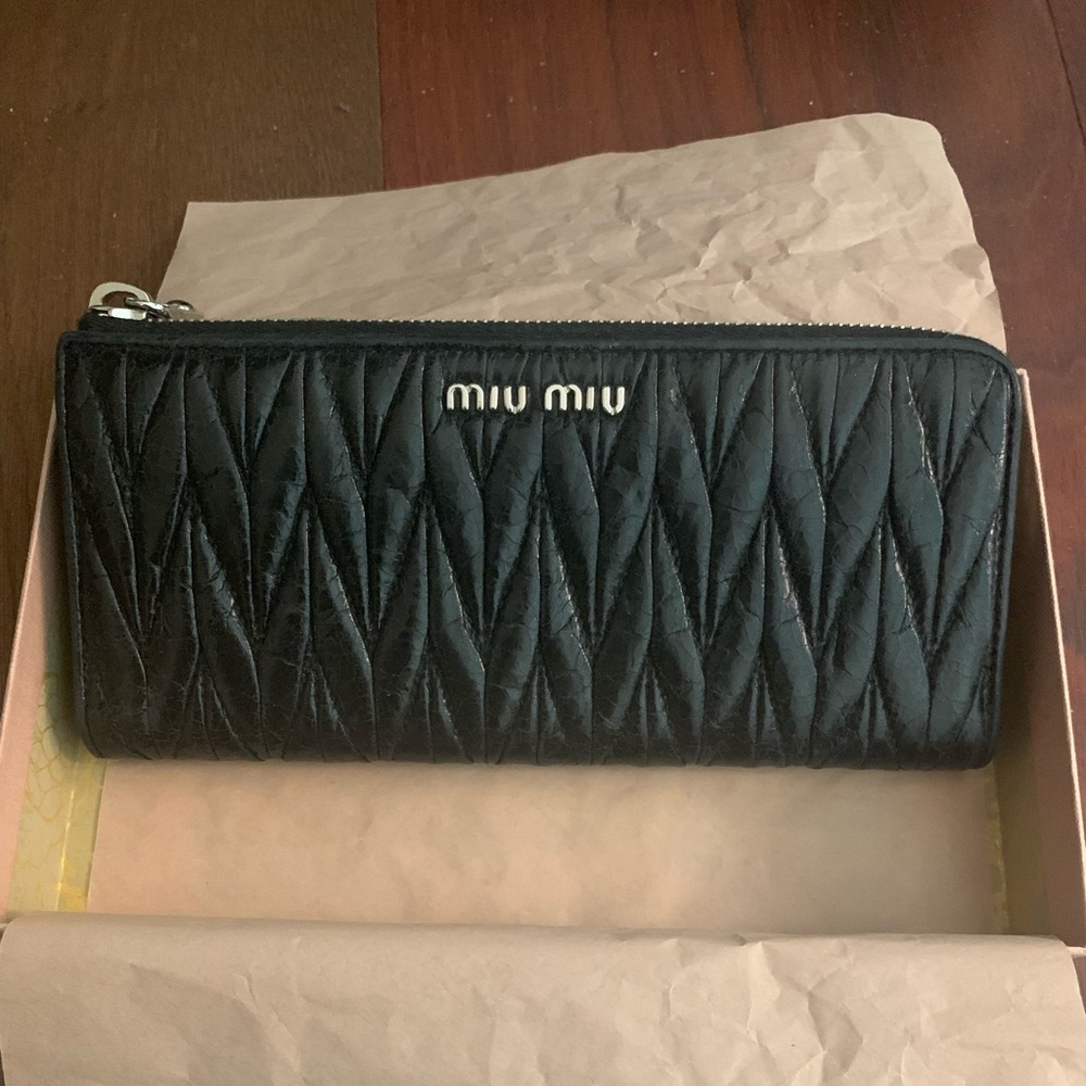 ON SALE miu miu matelasse wallet